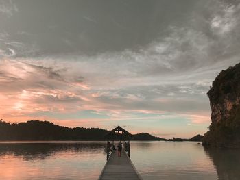 Scenic view of lake against sky during sunset