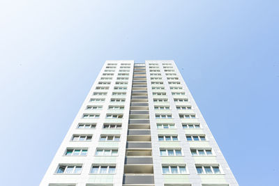 Low angle view of modern building against clear sky