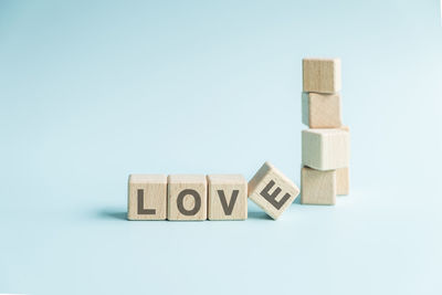 Close-up of toy blocks on blue background