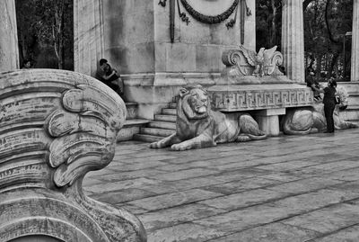 Stone sculptures of lion and eagle