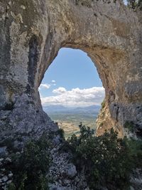 Scenic view of rock formation against sky