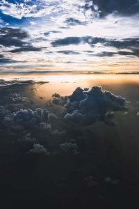 Low angle view of cloudscape against sky during sunset