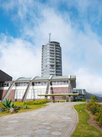 Buildings in city against sky