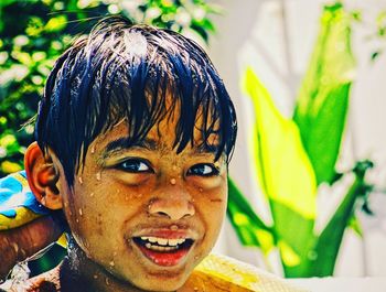 Close-up portrait of smiling boy