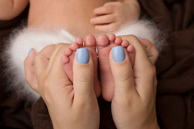 Close-up of woman with hands