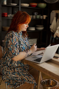 Woman using laptop