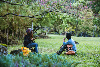 Couple sitting at park