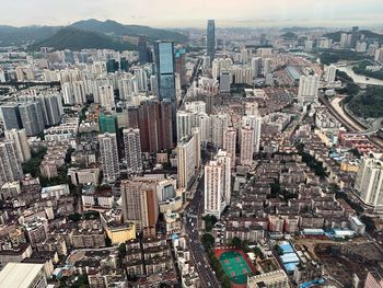 High angle view of modern buildings in city