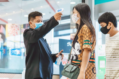 Young woman using mobile phone