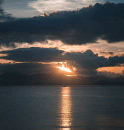 Scenic view of sea against sky during sunrise