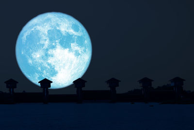 Scenic view of moon against sky at night