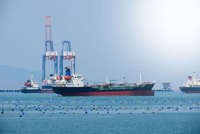 Nautical vessel on sea against sky