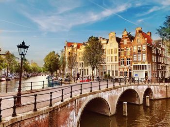 View of bridge over river in city