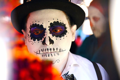 Close-up portrait of man with mask