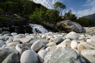 Rocks by river