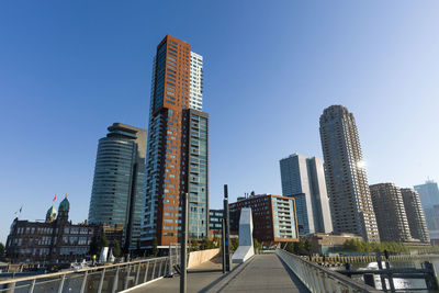 Low angle view of buildings against clear sky