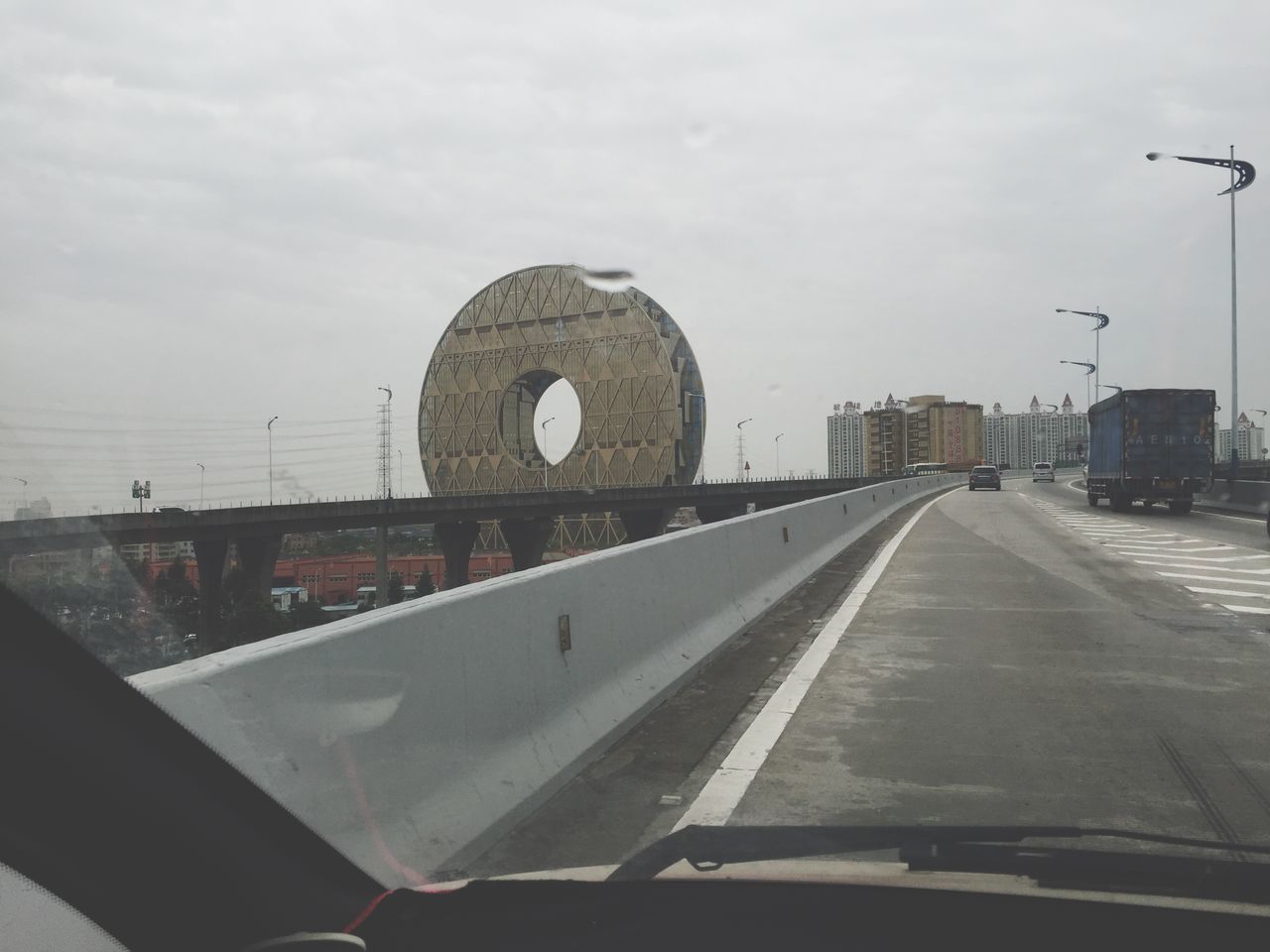 ROAD SEEN FROM CAR WINDSHIELD