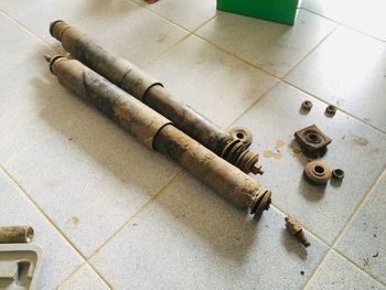 High angle view of objects on tiled floor