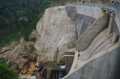 High angle view of dam against cloudy sky