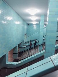 Reflection of illuminated lights in subway