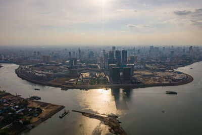 High angle view of river amidst buildings in city