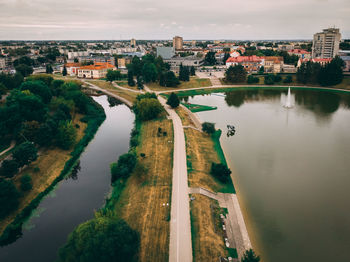 High angle view of river amidst buildings in city