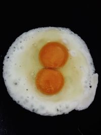 Directly above shot of breakfast on black background