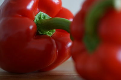 Close-up of red bell peppers on table