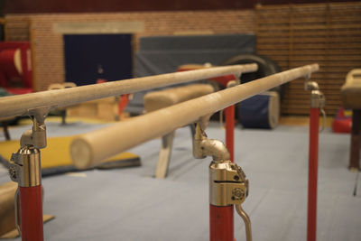 Close-up of chain hanging on railing