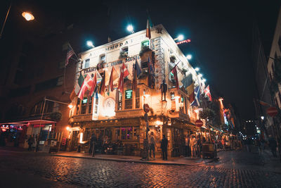 View of illuminated buildings at night