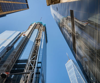 Low angle view of modern buildings against sky