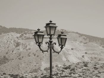 Lamp post against clear sky