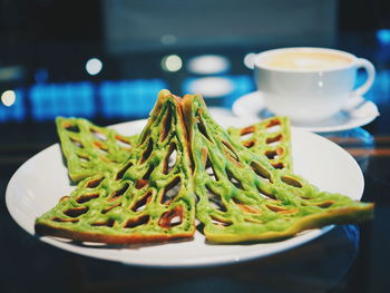 Close-up of food served on table