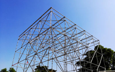 Low angle view of built structure against blue sky