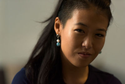 Close-up portrait of young woman