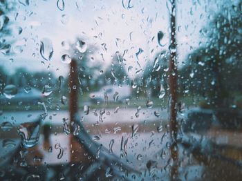 Close-up of raindrops on glass window