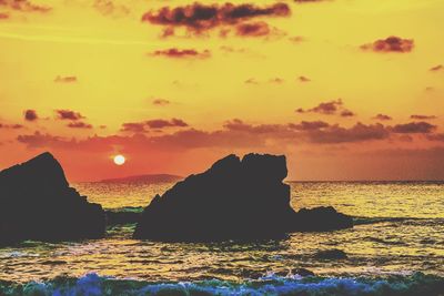 Scenic view of sea against sky during sunset