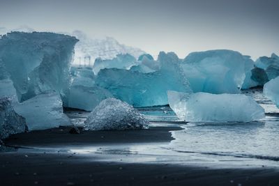 Scenic view of frozen sea against sky