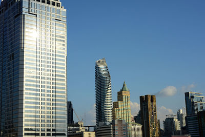 Skyscrapers in city against clear sky