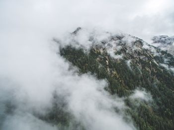 Scenic view of mountains against sky during winter