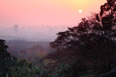 Scenic view of mountains against sky at sunset