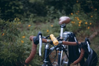 Close-up of bicycle on field