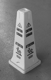 High angle view of information sign on table