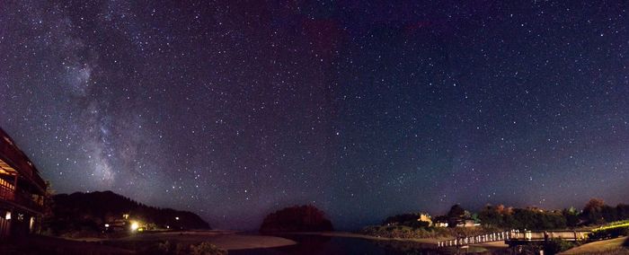 Scenic view of star field against sky at night