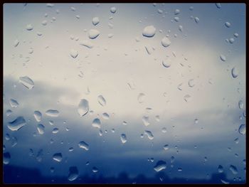 Close-up of water drops on glass