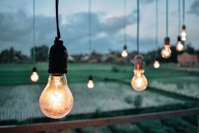 Close-up of illuminated light bulb