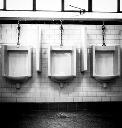 Urinals in public restroom