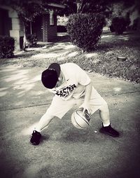 Boy playing with ball