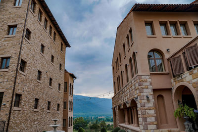 Low angle view of old building against sky