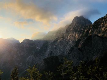 Scenic view of mountains against sky during sunset